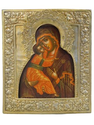 Icona della Madre di Dio di Vladimir del 1873, mostrando dettagliati ornamenti e colori vivaci che illustrano la Vergine Maria con il Bambino, custodita dalla tradizione sacra di Mosca, disponibile su Arte Network Icone.