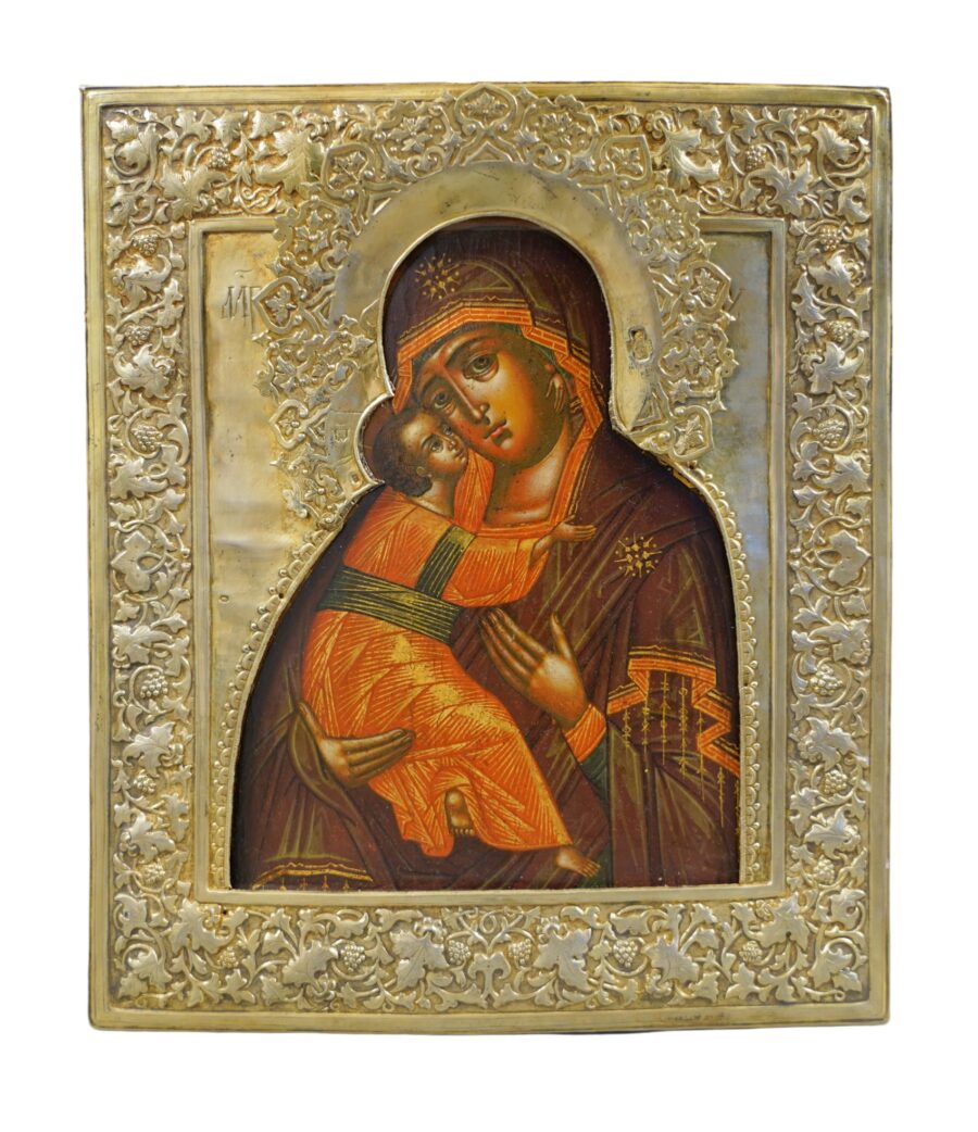 Icona della Madre di Dio di Vladimir del 1873, mostrando dettagliati ornamenti e colori vivaci che illustrano la Vergine Maria con il Bambino, custodita dalla tradizione sacra di Mosca, disponibile su Arte Network Icone.